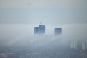 Image 3,6: A crane atop a condo development in Toronto on April 16.