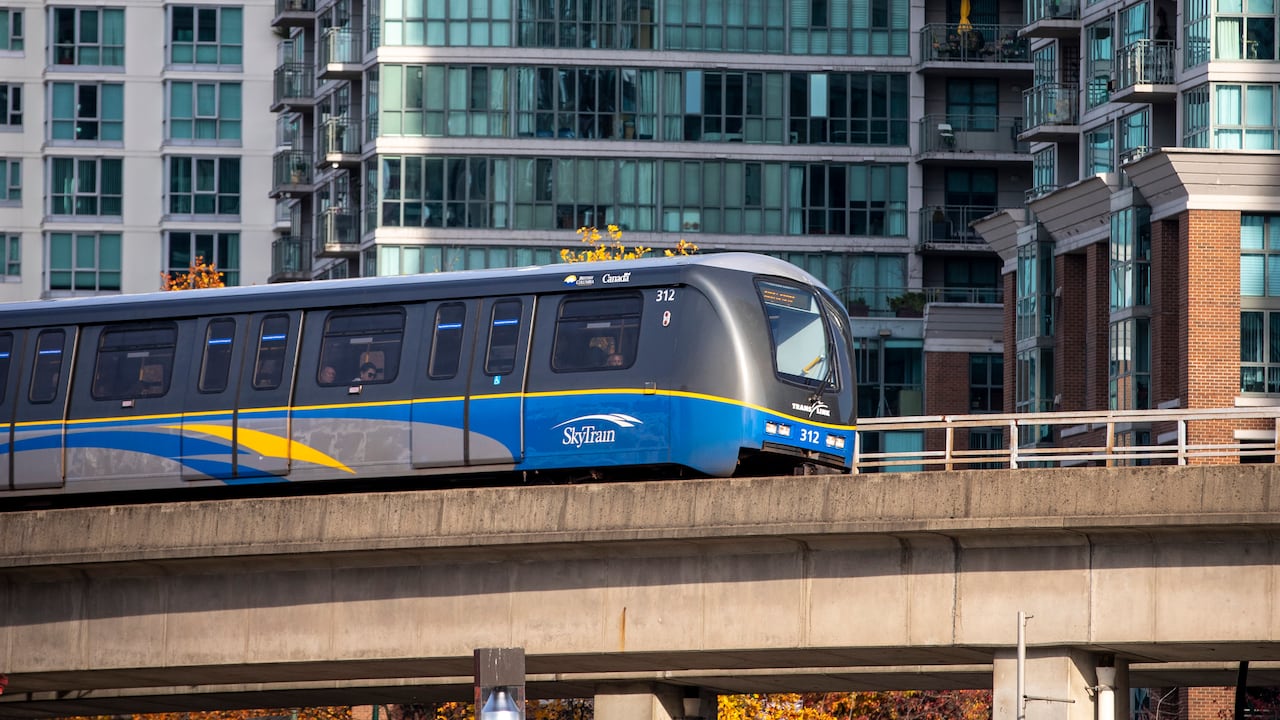 Image 4: A Skytrain is pictured along the Expo Line in Vancouver, British Columbia on Friday, November 1, 2019.